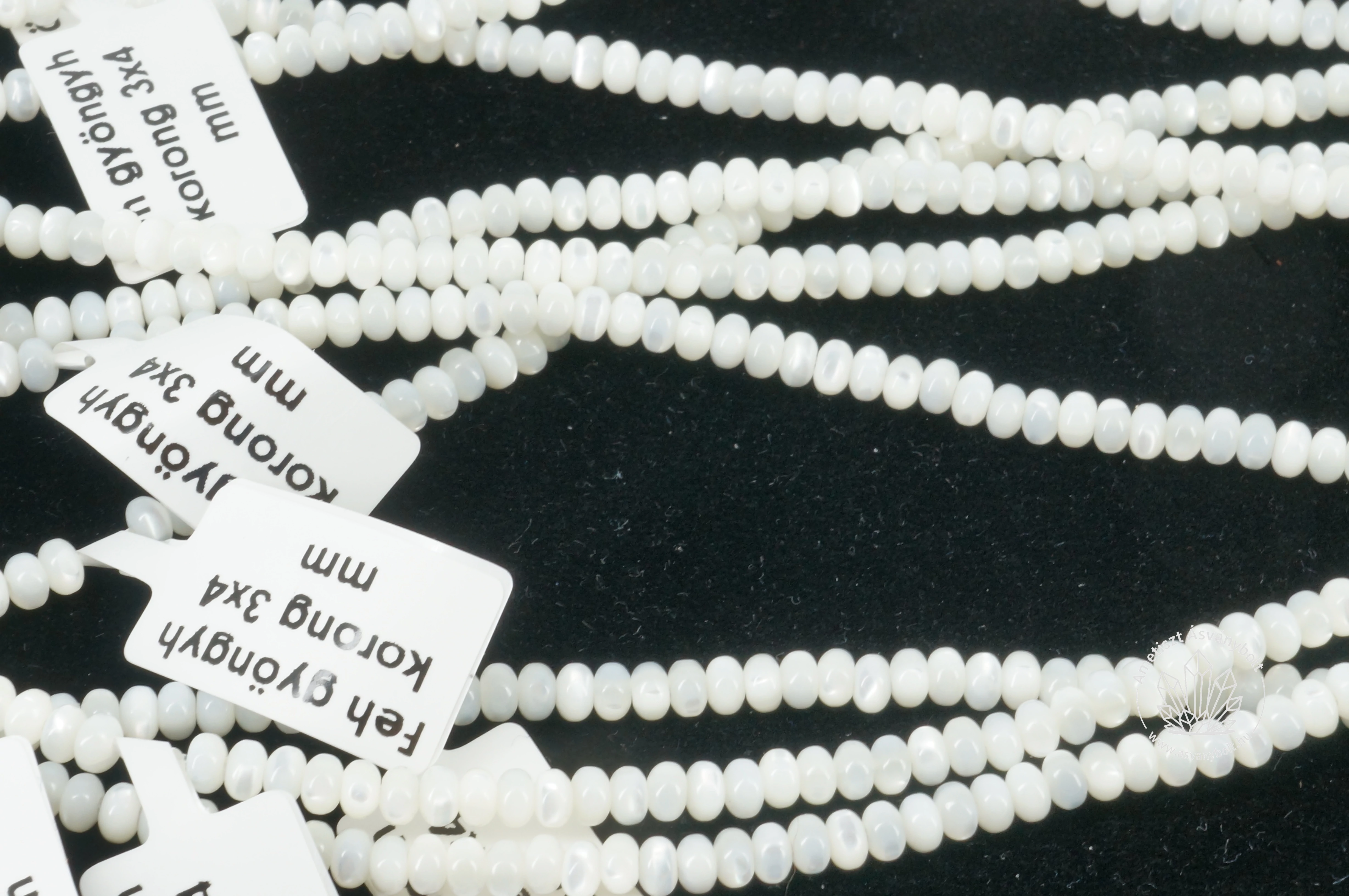 Fehér gyöngyház 3x4 mm korong szál